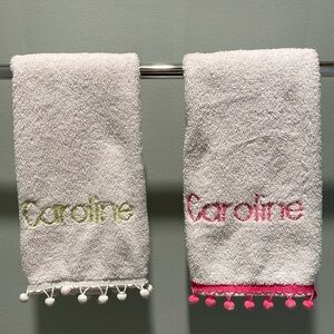 Two Raffia hand towels monogrammed with Caroline